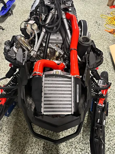 Ski-Doo turbo build with intercooler and red silicone piping by MJC Xtreme Powersports